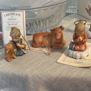 Hummel nativity figurines 
Boy with calf, ox, a tender player for all
